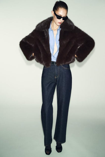 Manteau court effet fourrure à col revers