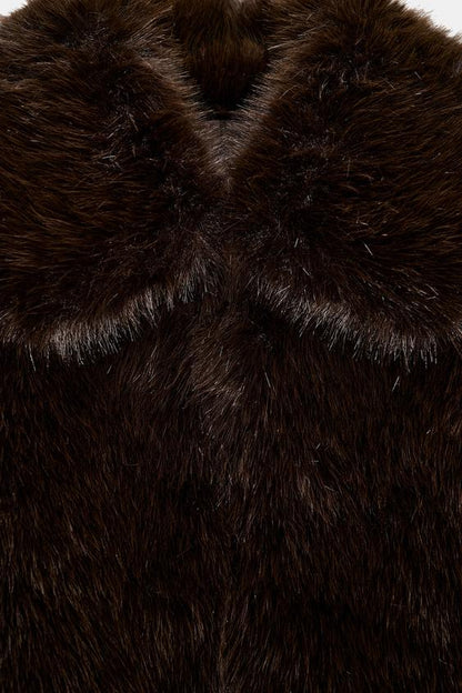 Manteau court effet fourrure à col revers