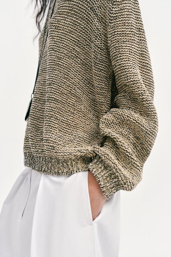 Pull en maille à fil métallisé