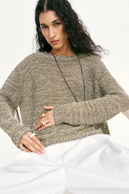 Pull en maille à fil métallisé