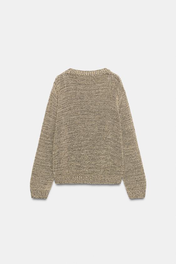 Pull en maille à fil métallisé