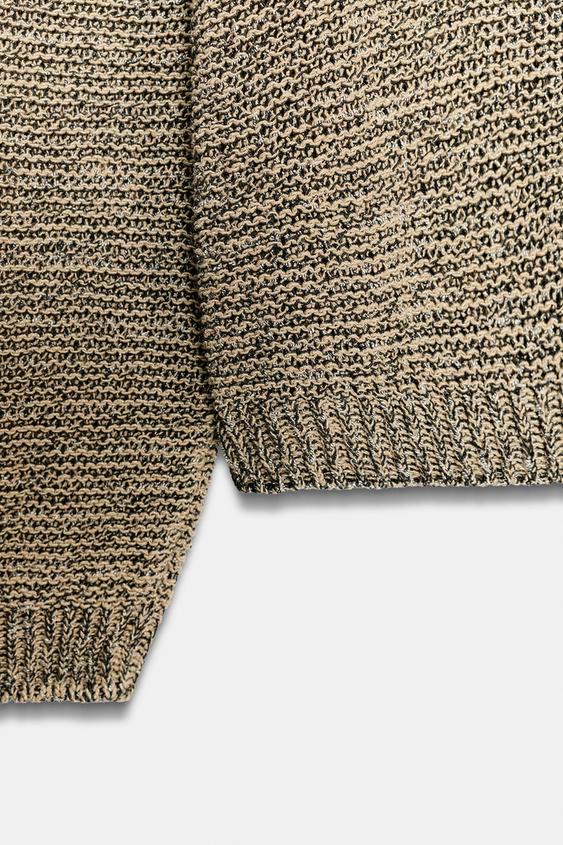 Pull en maille à fil métallisé