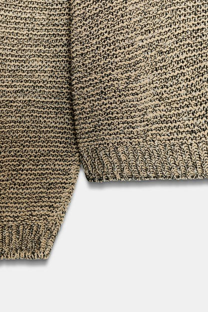Pull en maille à fil métallisé