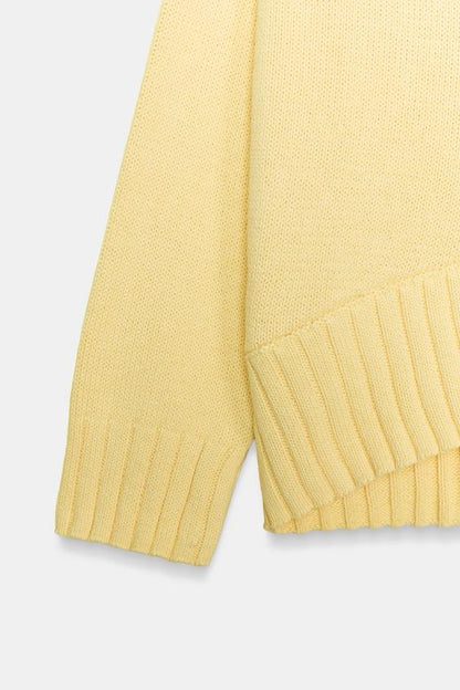 Pull en maille à bas asymétrique