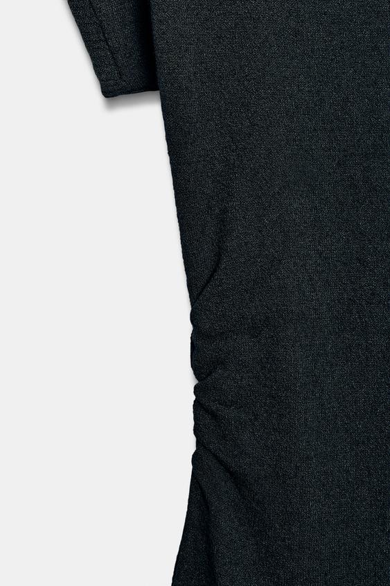 Robe longue en maille à fronces latérales