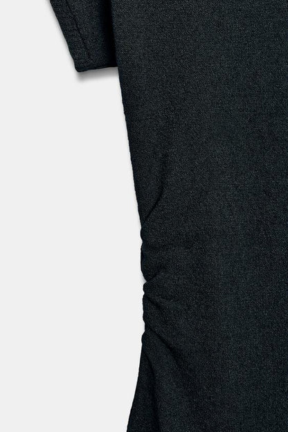Robe longue en maille à fronces latérales