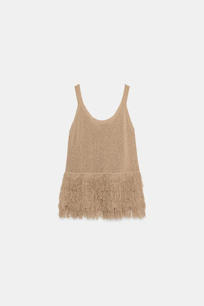 Top en maille à franges