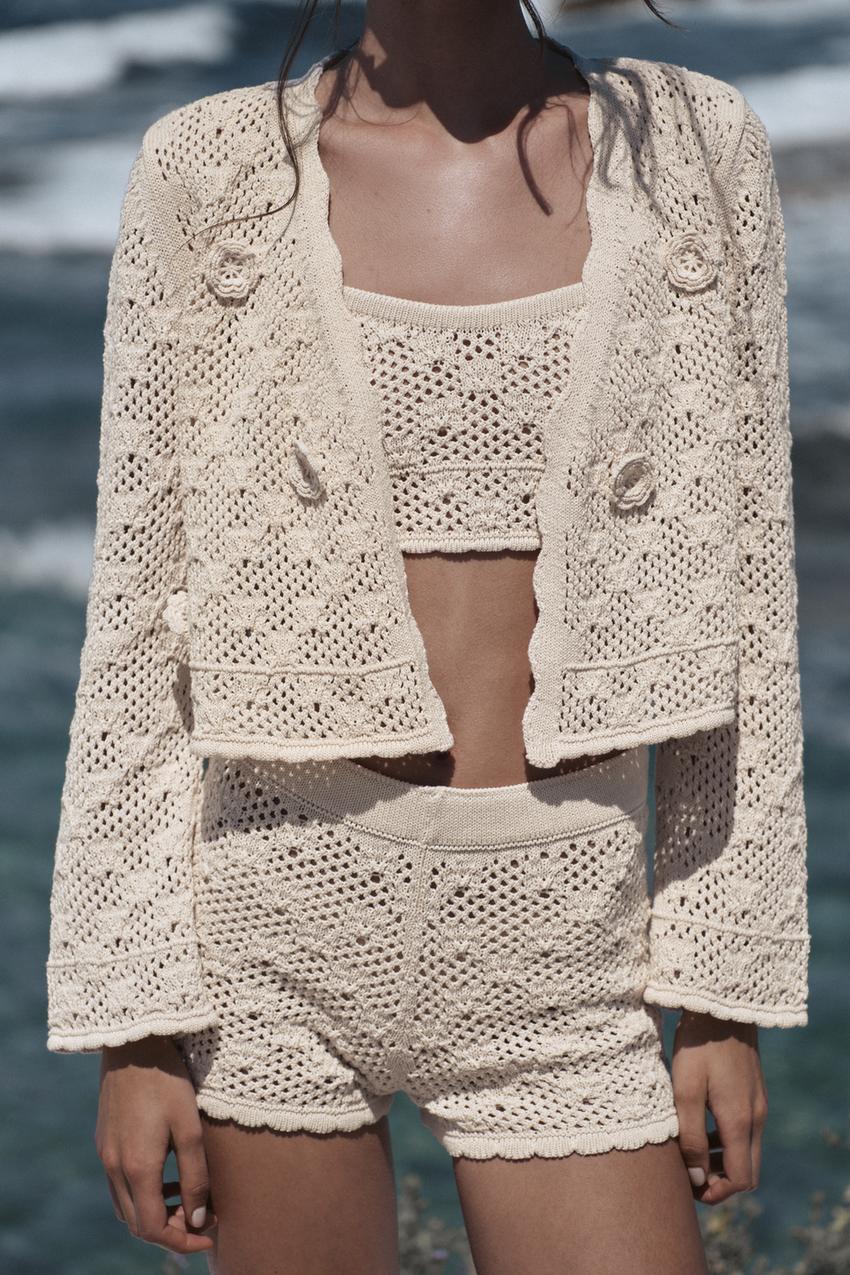 Veste en maille pointelle à fleurs