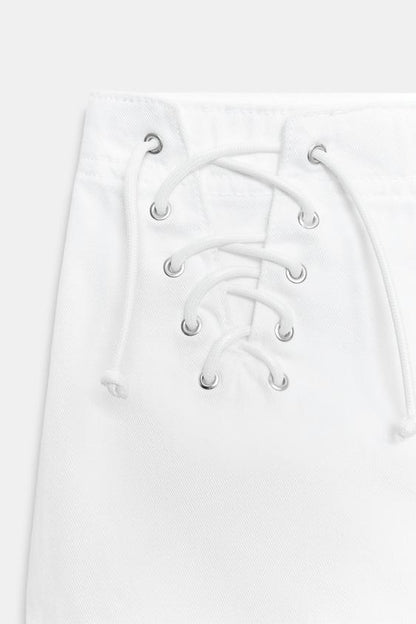 Short mini à cordons croisés