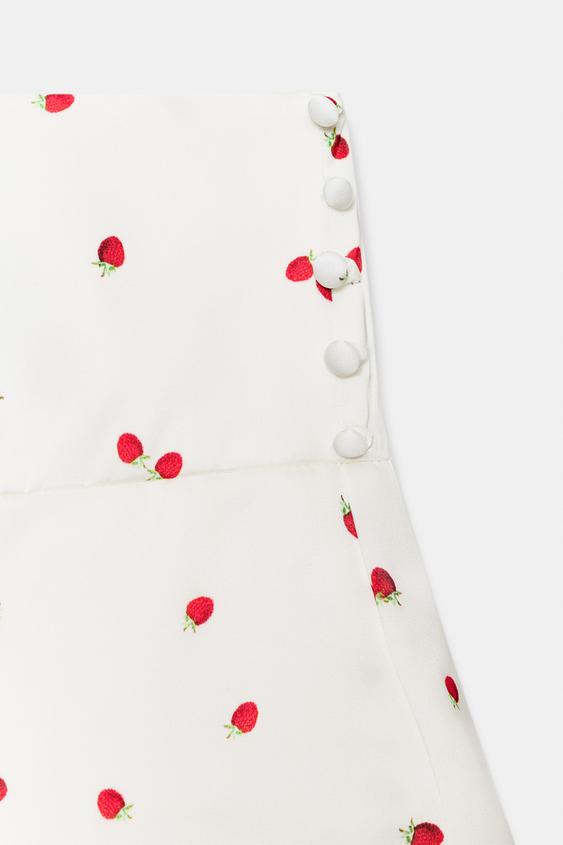 Jupe mini à volants à motif fraises