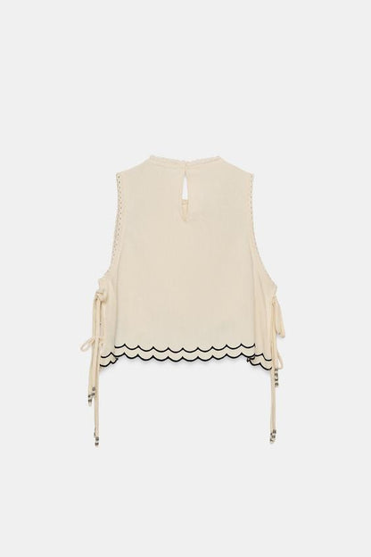 Top brodé à perles
