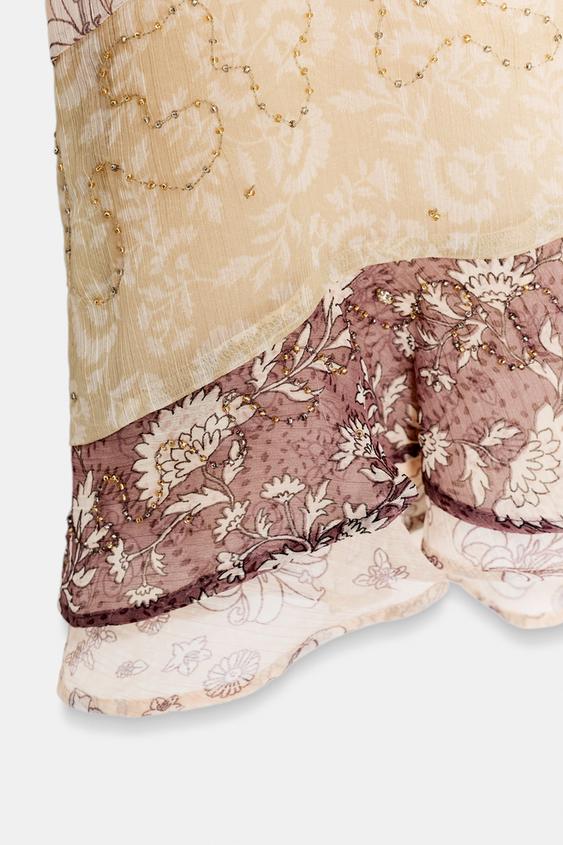 Robe dos-nu imprimée à perles