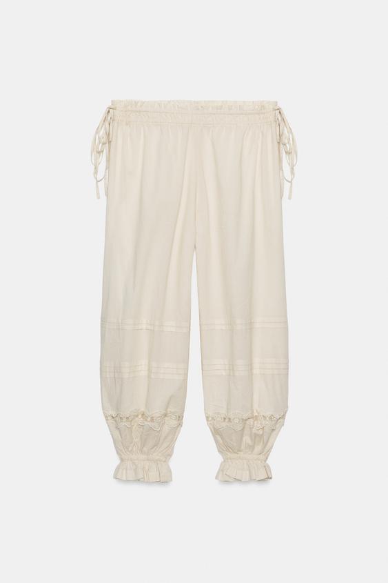 Pantalon bouffant à plis en dentelle