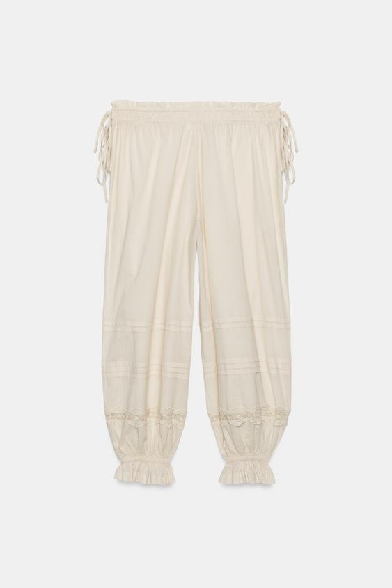 Pantalon bouffant à plis en dentelle