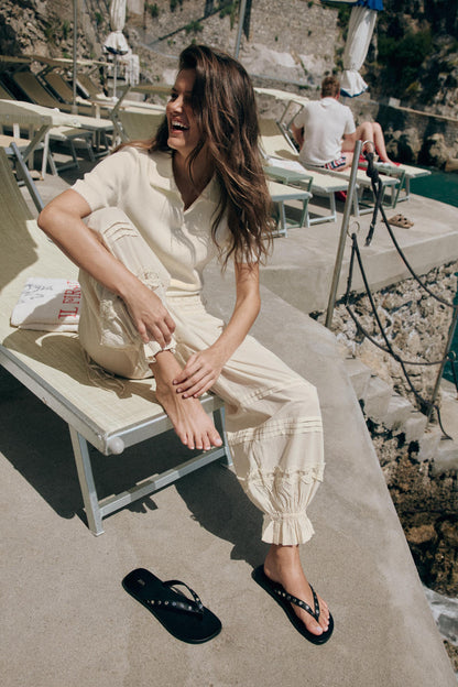 Pantalon bouffant à plis en dentelle