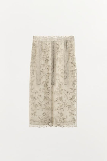 Jupe en organza brodée à perles