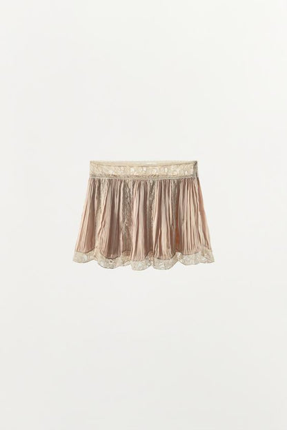 Jupe mini plissée en dentelle à perles