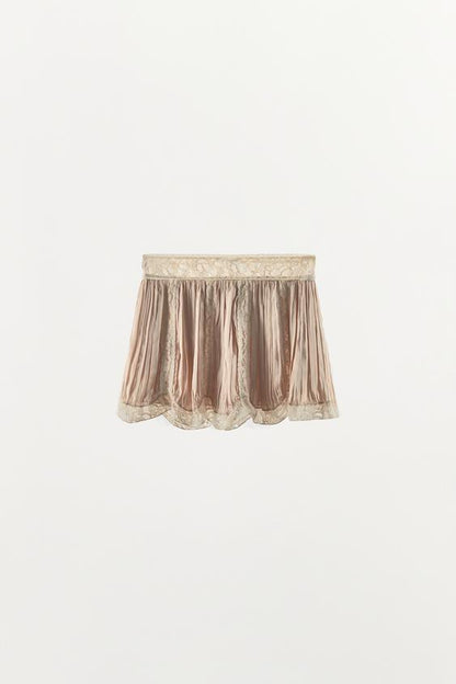 Jupe mini plissée en dentelle à perles