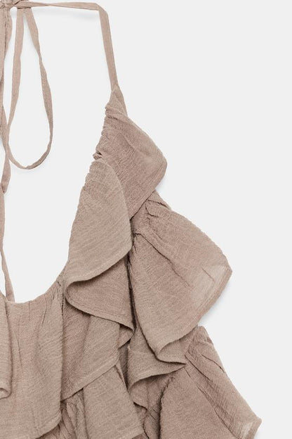 Robe en mousseline dos-nu à volants