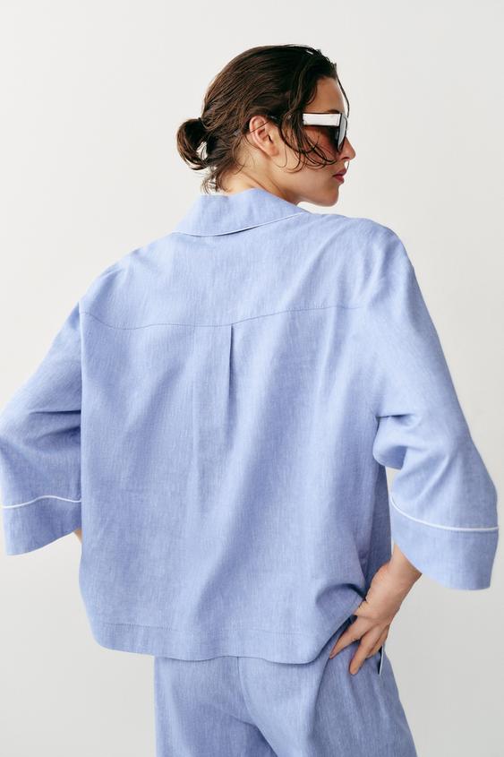 Blouse en lin à détails passepoilés