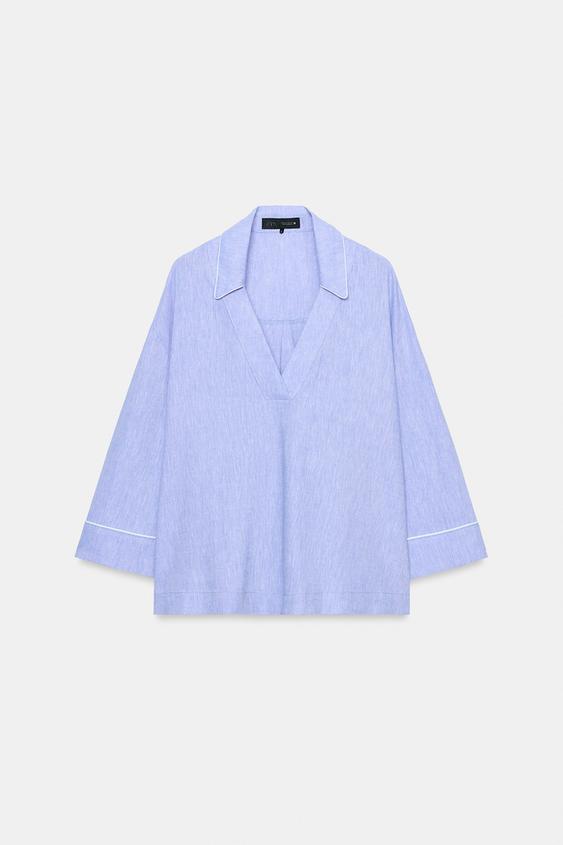 Blouse en lin à détails passepoilés