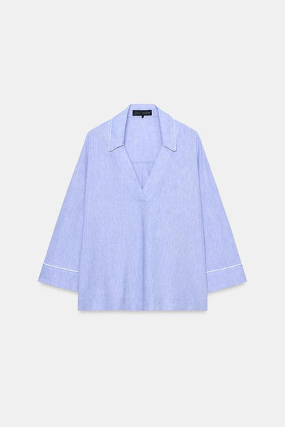 Blouse en lin à détails passepoilés