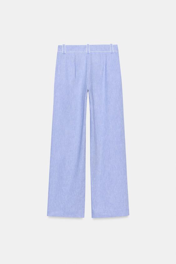 Pantalon en lin à détails passepoilés