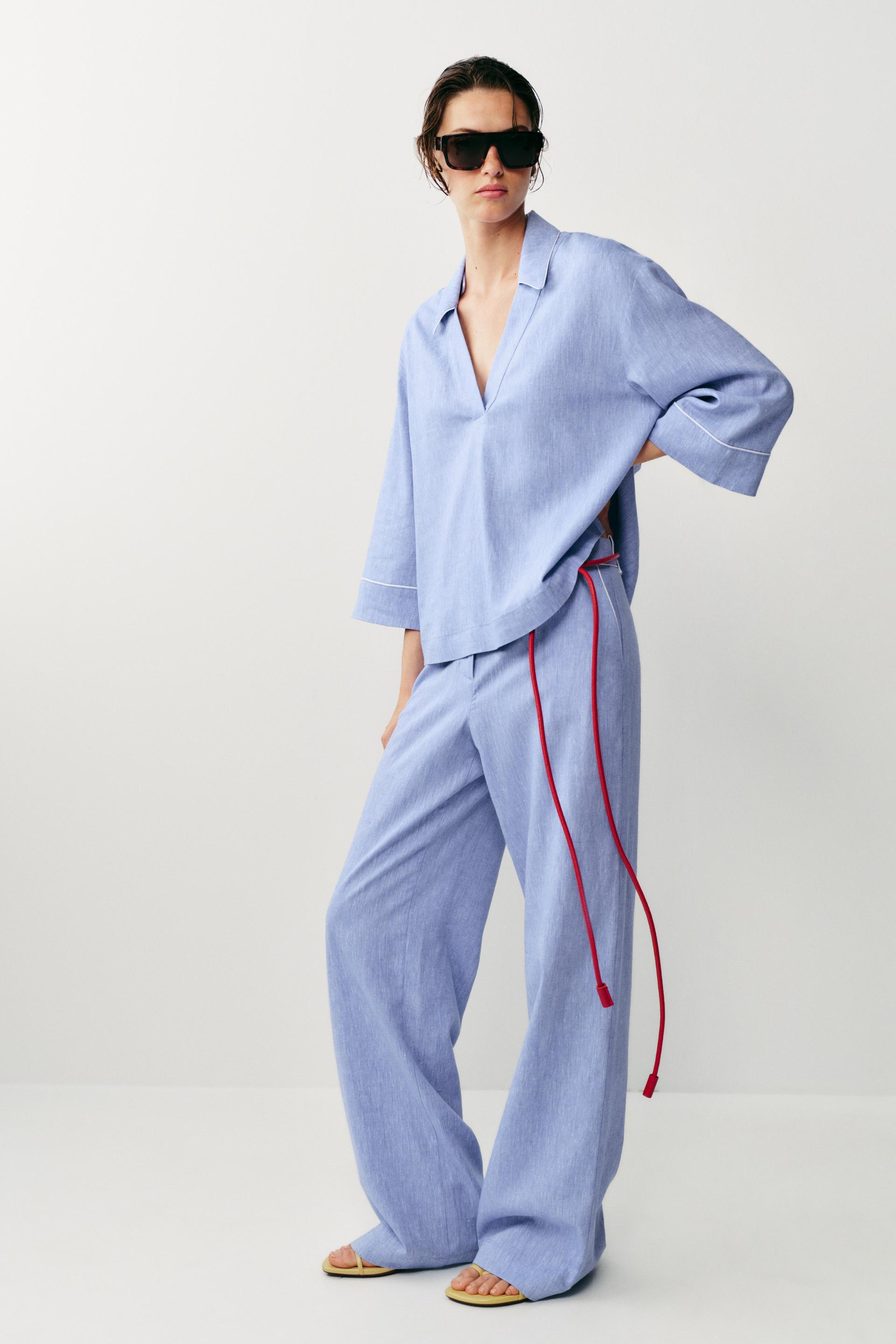 Pantalon en lin à détails passepoilés