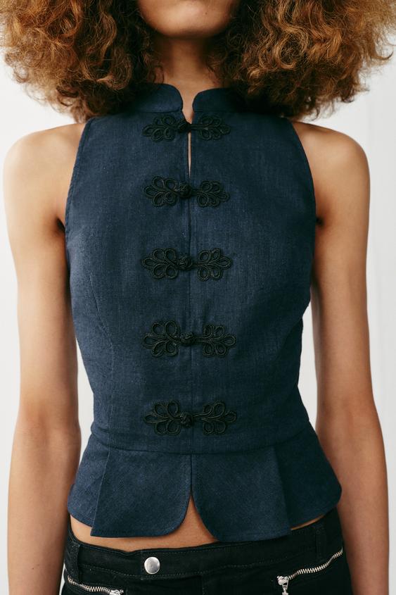 Top peplum à brandebourgs en lin