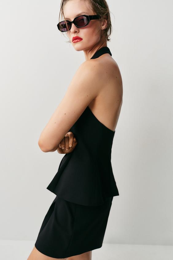 Top façon gilet à encolure dos-nu à bouton recouvert