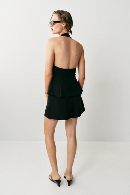 Top façon gilet à encolure dos-nu à bouton recouvert