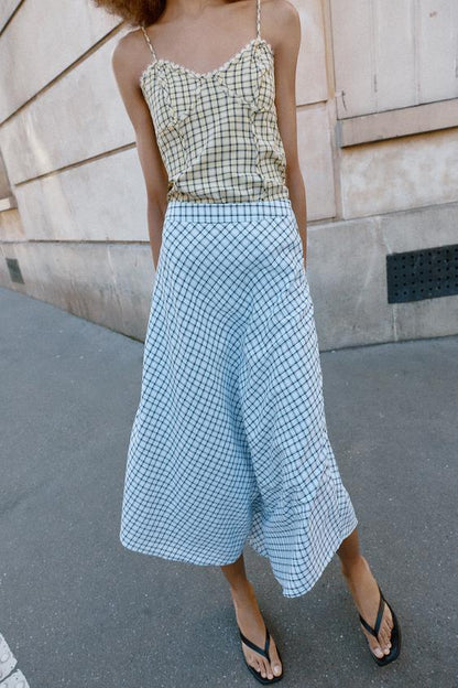 Jupe midi à carreaux asymétrique