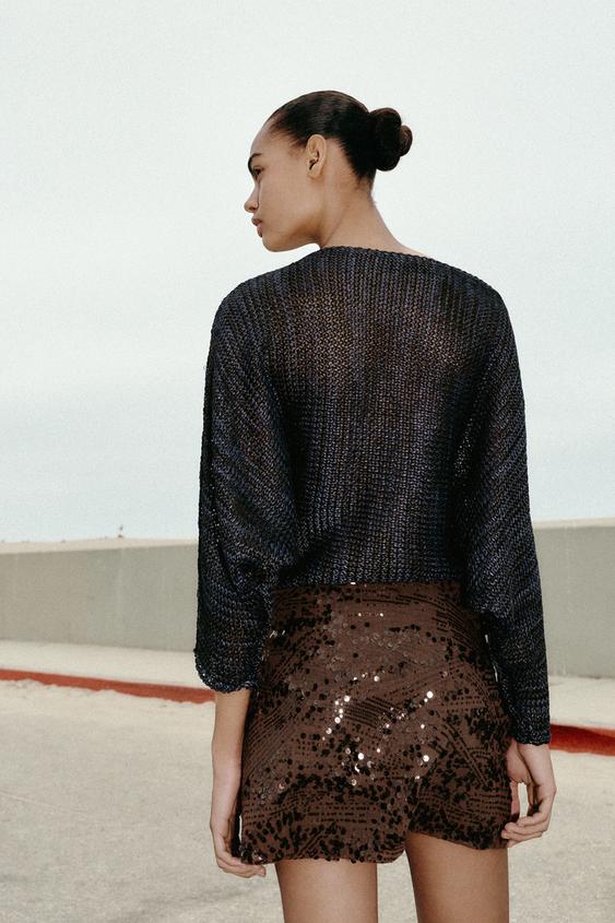 Jupe-culotte mini à sequins avec nœud
