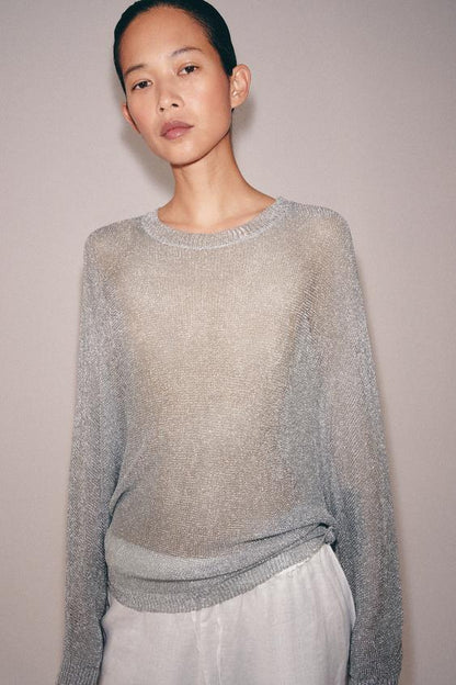 Pull en maille à fil métallisé