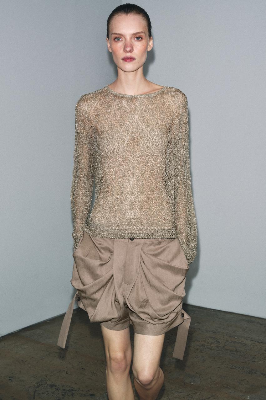Pull en maille pointelle à fil métallisé