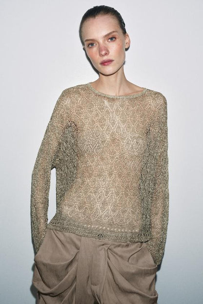 Pull en maille pointelle à fil métallisé