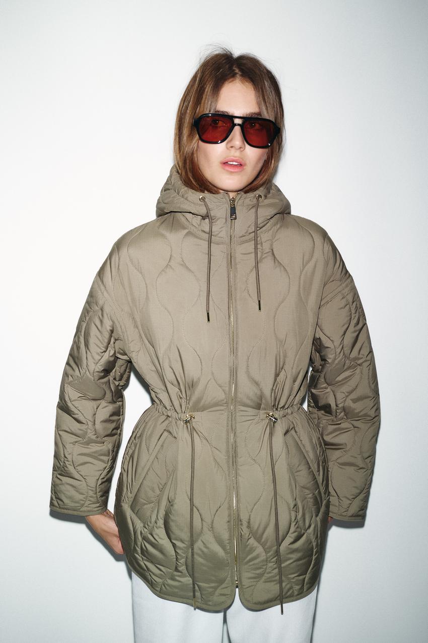 Blouson matelassé à capuche déperlant