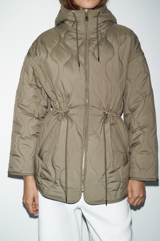 Blouson matelassé à capuche déperlant