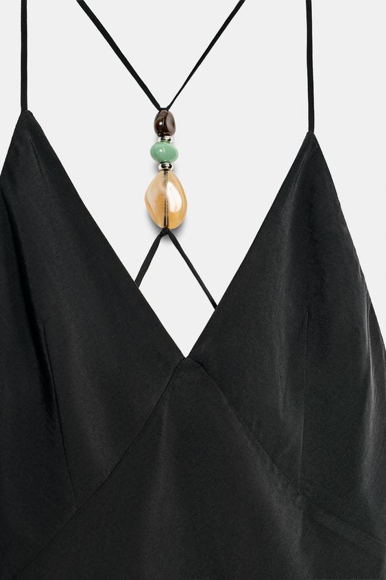 Robe midi à bretelles ornées de pierres