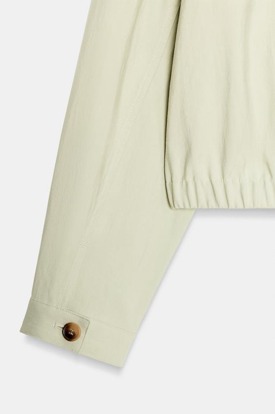 Veste courte à poches à rabat