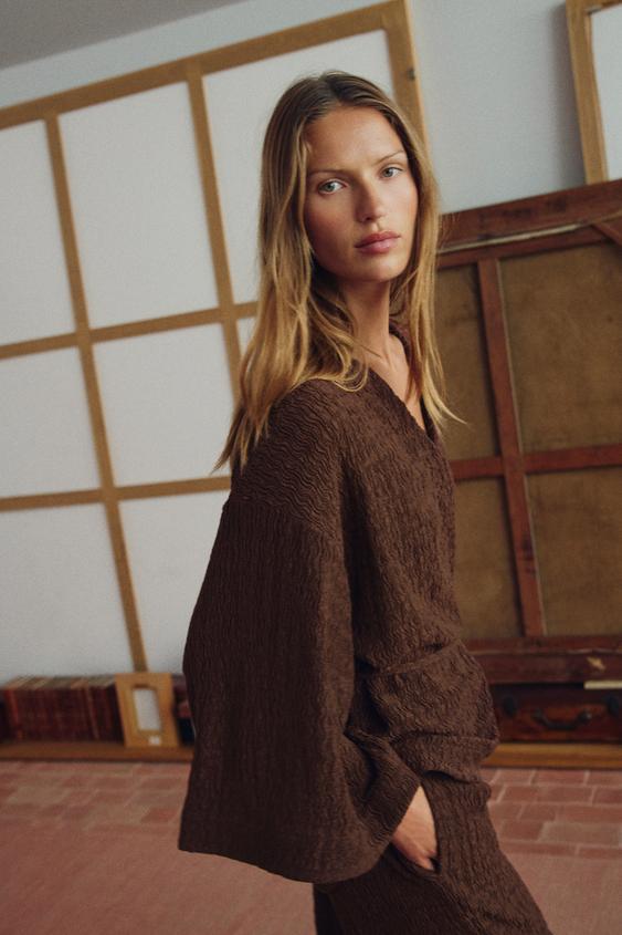 Veste avec ceinture effet froissé