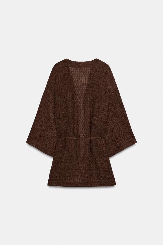 Veste avec ceinture effet froissé