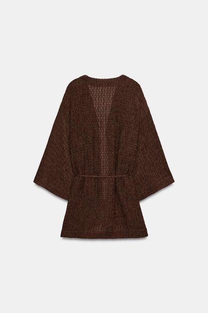 Veste avec ceinture effet froissé