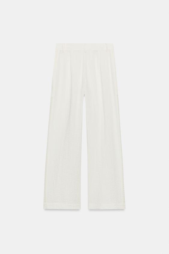 Pantalon à empiècements latéraux
