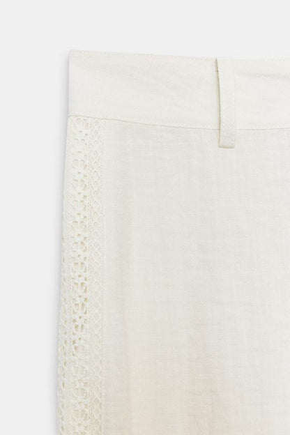 Pantalon à empiècements latéraux