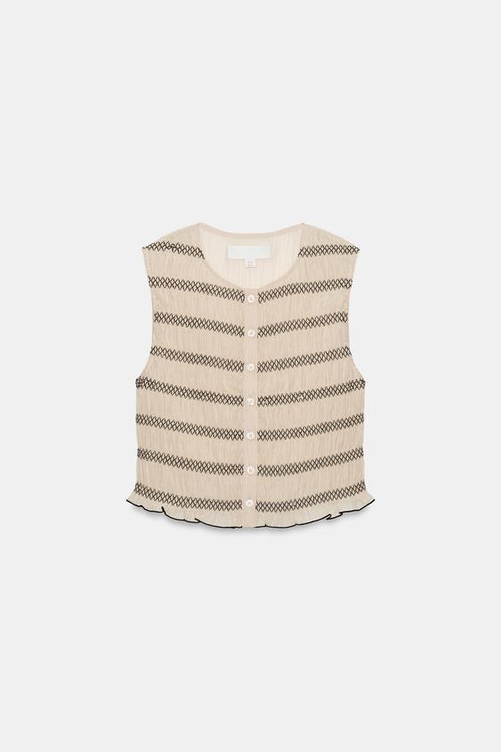 Top façon gilet à coutures contrastées