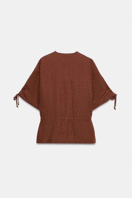 Veste safari à manches courtes à perles