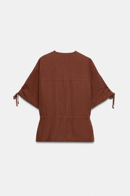Veste safari à manches courtes à perles