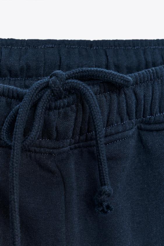 Pantalon basique en molleton, coupe droite et bas réglable