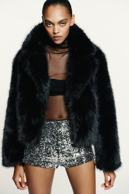 Manteau court effet fourrure